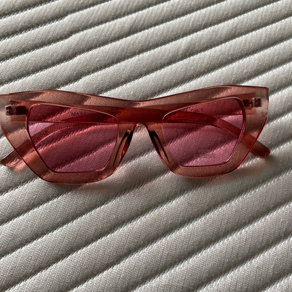 Pink sunglasses with pink frames